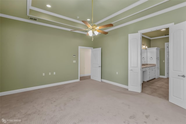 unfurnished bedroom with light carpet, baseboards, visible vents, and crown molding