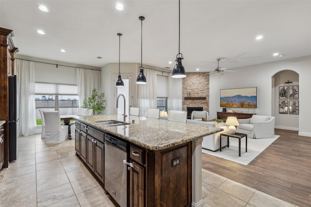 8 Center Ct, Heath, TX 75032 - kitchen featuring stainless steel dishwasher, ceiling fan, freestanding refrigerator, recessed lighting, and dark brown cabinets