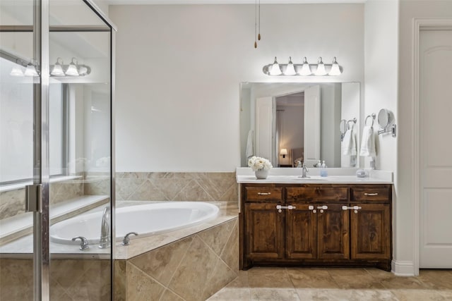 8 Center Ct, Heath, TX 75032 - full bathroom with vanity, a garden tub, and a shower stall