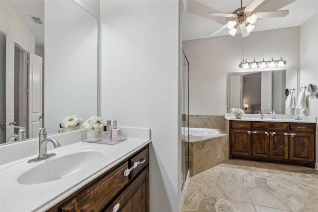 8 Center Ct, Heath, TX 75032 - bathroom with vanity, a garden tub, a ceiling fan, and a shower stall