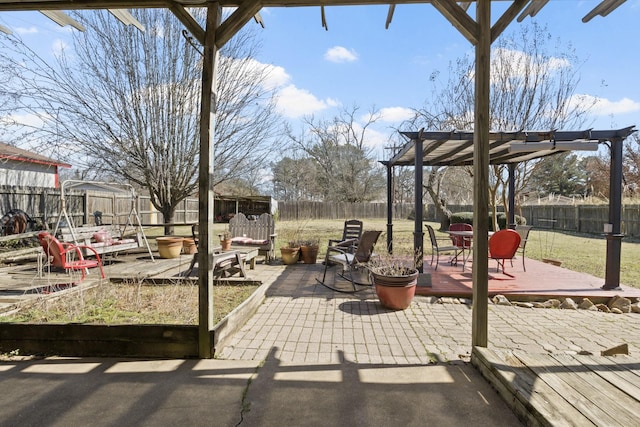 view of patio / terrace with a fenced backyard, a pergola, and a wooden deck