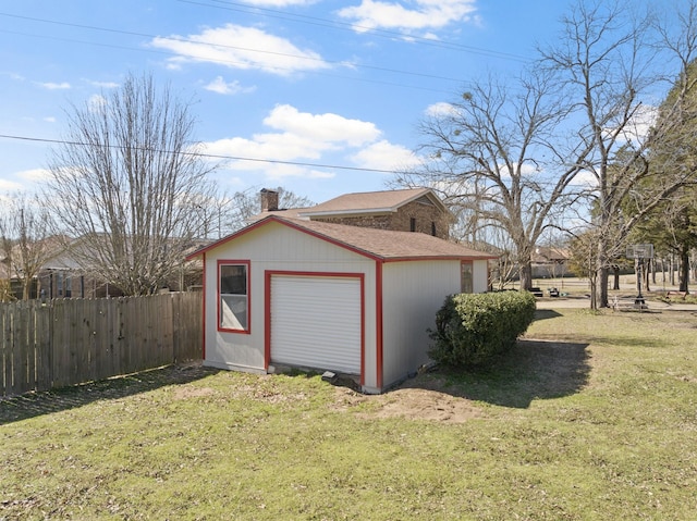 garage with fence