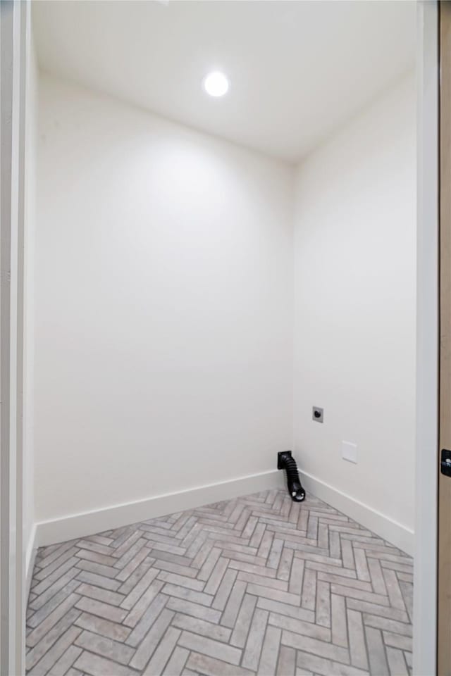 laundry room featuring recessed lighting, laundry area, electric dryer hookup, and baseboards