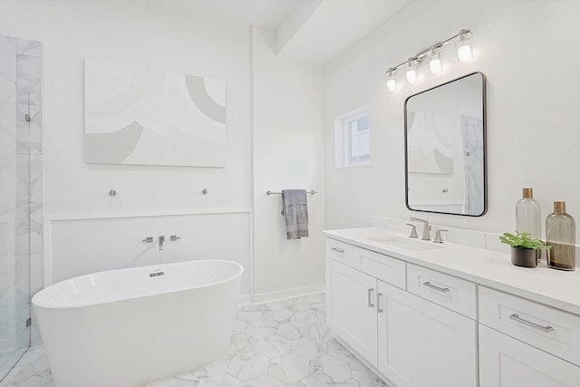 bathroom with marble finish floor, a soaking tub, vanity, and a shower stall