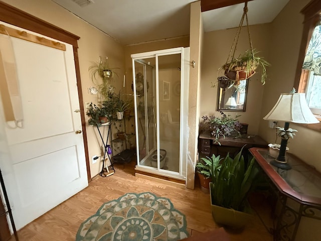 doorway to outside featuring wood finished floors