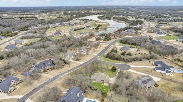 aerial view featuring a residential view and a water view