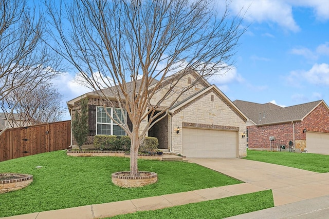 view of front of property with an attached garage, a front yard, fence, stone siding, and driveway