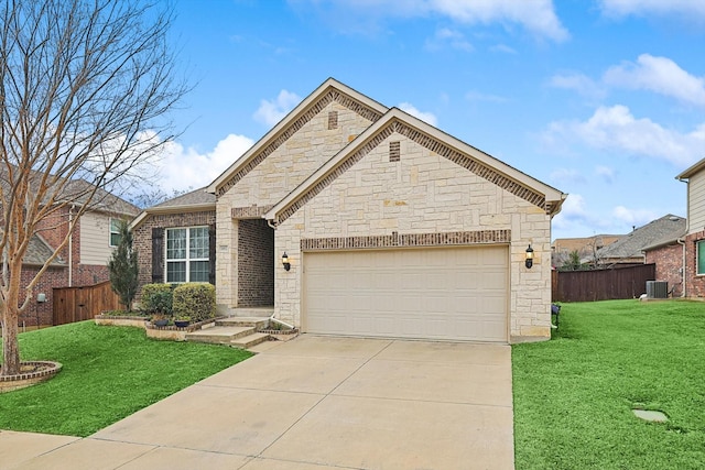 view of front of house featuring cooling unit, a garage, fence, concrete driveway, and a front yard