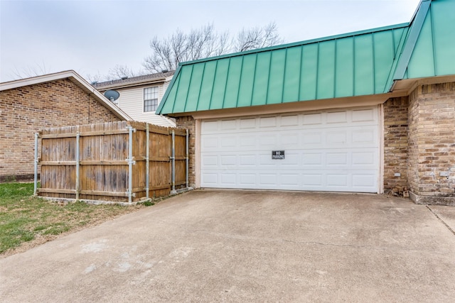 garage with fence