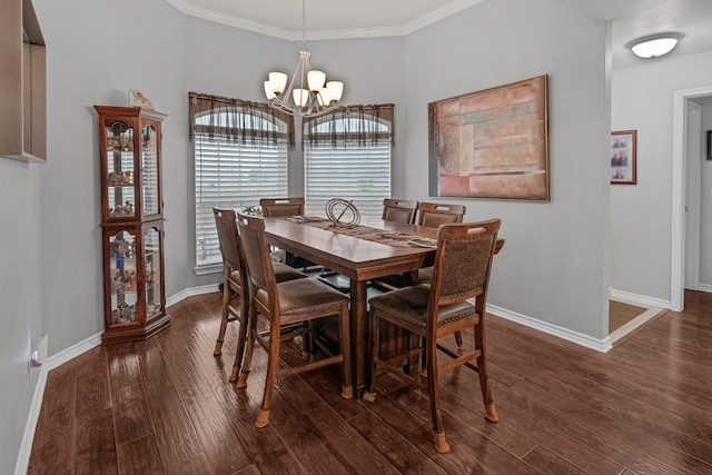 dining space featuring a healthy amount of sunlight, baseboards, dark wood finished floors, and a notable chandelier