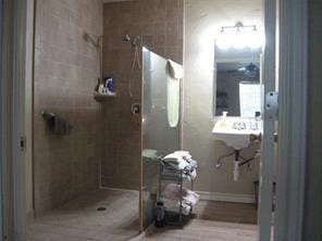 full bathroom with a stall shower