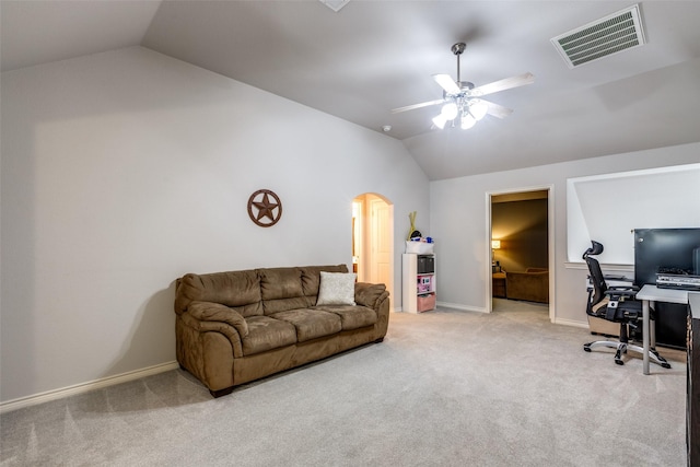 living area featuring visible vents, arched walkways, a ceiling fan, light colored carpet, and lofted ceiling