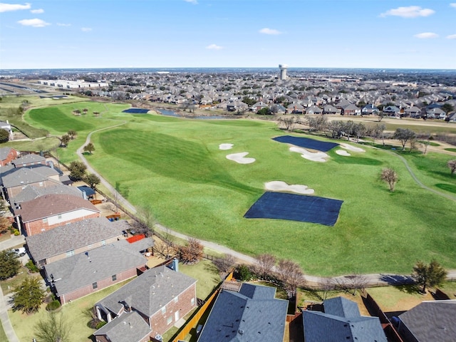 aerial view featuring golf course view and a residential view