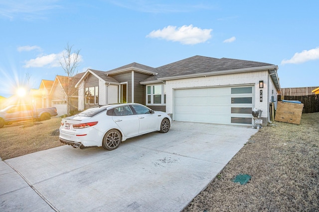 single story home featuring driveway, an attached garage, and brick siding