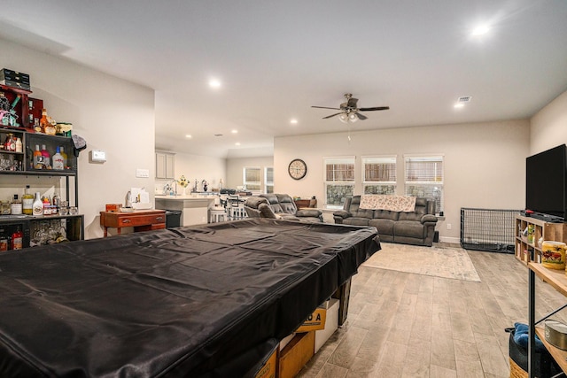 game room with ceiling fan, recessed lighting, billiards, light wood-type flooring, and a dry bar