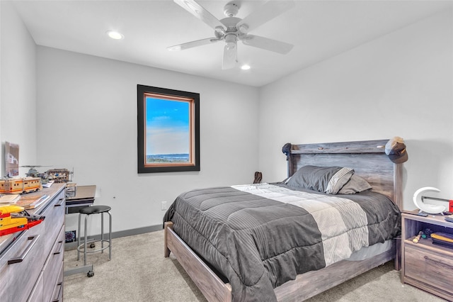 bedroom featuring light carpet, ceiling fan, recessed lighting, and baseboards