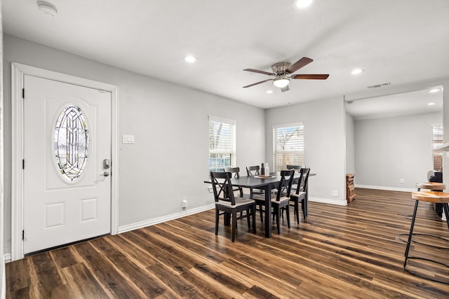 dining space featuring visible vents, baseboards, dark wood-style flooring, and recessed lighting