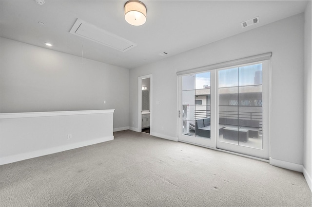 3200 Ross Ave Unit 40, Dallas, TX 75204 - carpeted spare room featuring attic access and baseboards