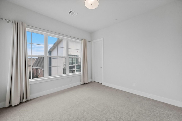 3200 Ross Ave Unit 40, Dallas, TX 75204 - empty room with baseboards and light carpet