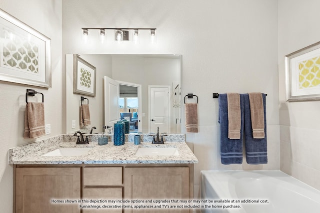 210 Shawnee Trl, Alvarado, TX 76009 - bathroom featuring double vanity, a sink, and a bath