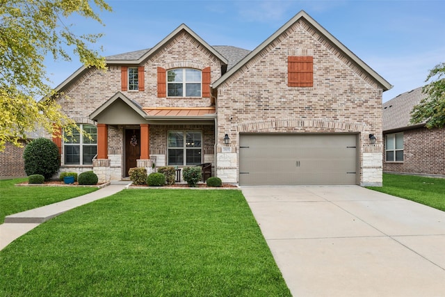 view of front facade featuring a garage, driveway, brick siding, and a front lawn