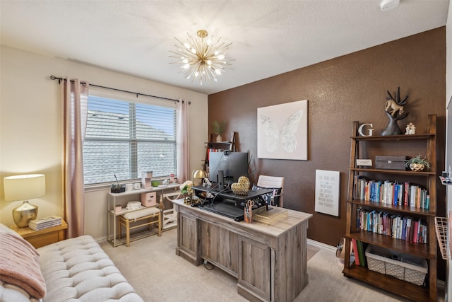 office space featuring light carpet, a textured wall, baseboards, and an inviting chandelier