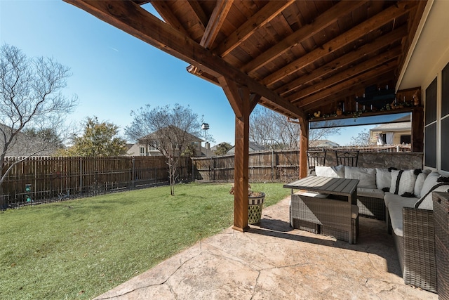 view of yard with a patio, a fenced backyard, and an outdoor hangout area