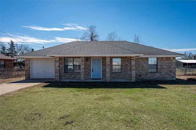 ranch-style home featuring a garage, fence, a front lawn, and concrete driveway