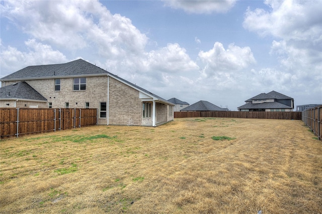 view of yard featuring a fenced backyard