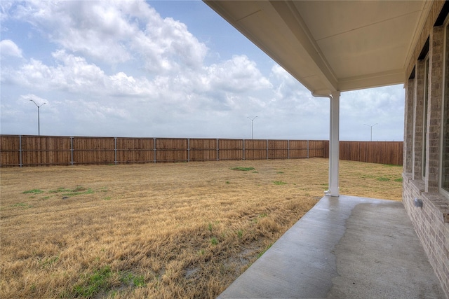 view of yard featuring a fenced backyard