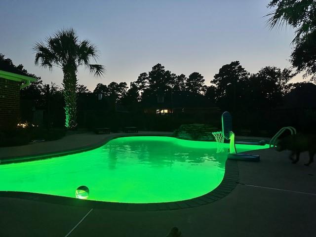 pool featuring a patio area