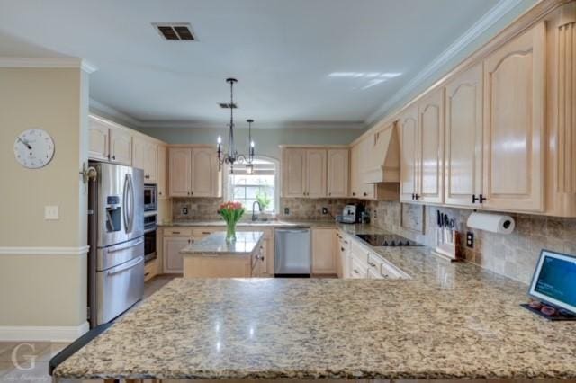 kitchen with visible vents, custom range hood, light brown cabinetry, appliances with stainless steel finishes, and a peninsula