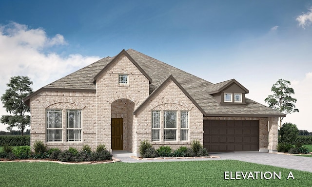 french country style house with brick siding, driveway, and a front lawn