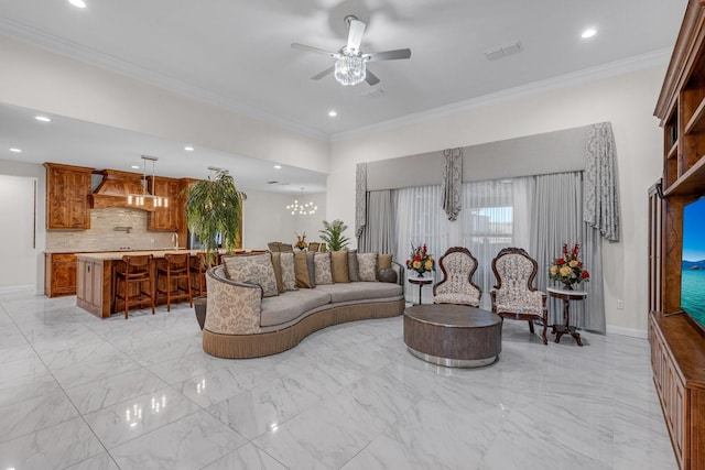 living area with marble finish floor, visible vents, and ornamental molding