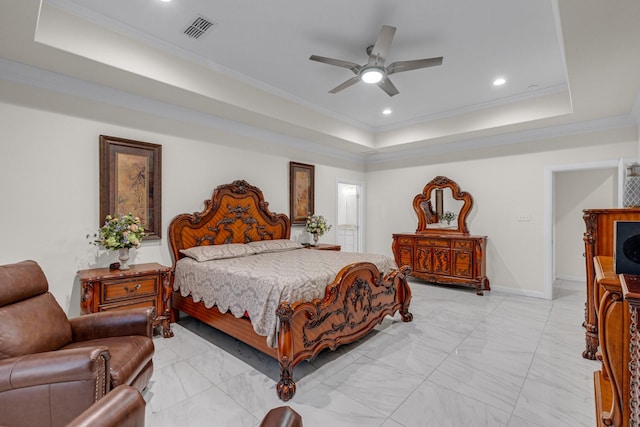 bedroom featuring ornamental molding, a raised ceiling, visible vents, and baseboards