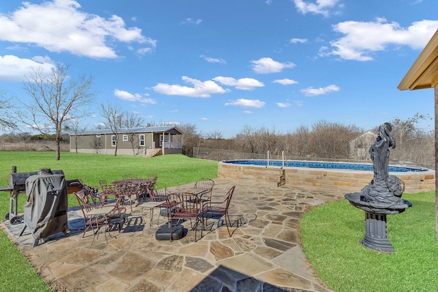 view of patio with an outdoor pool