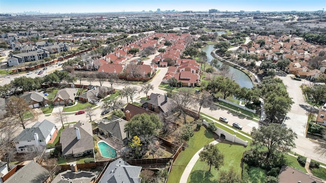 aerial view featuring a residential view and a water view