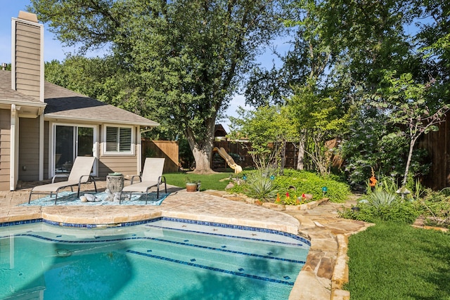 9005 Cumberland Dr, Irving, TX 75063 - view of swimming pool with a patio area