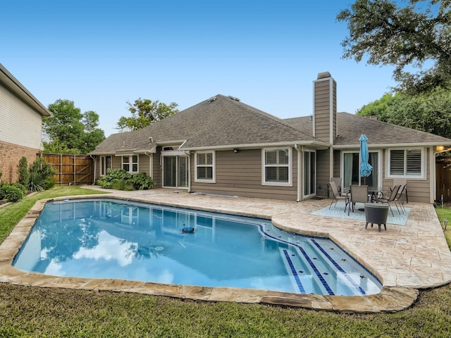 9005 Cumberland Dr, Irving, TX 75063 - view of pool featuring a patio area and a fenced backyard