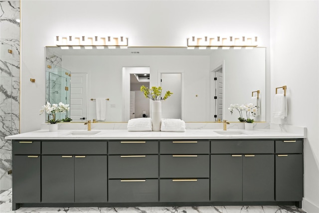 bathroom featuring marble finish floor, a sink, a marble finish shower, and double vanity