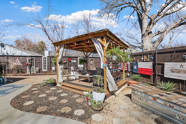 exterior space with fence and a deck