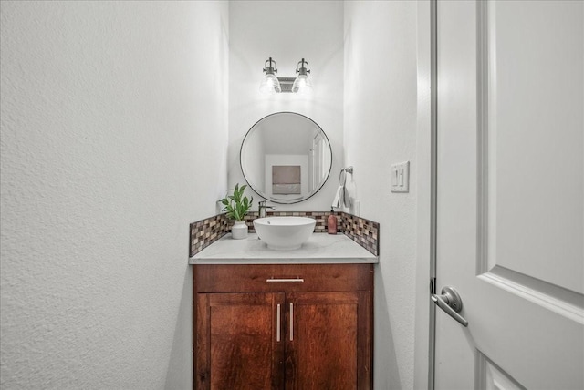 709 E 1st St, Fort Worth, TX 76102 - bathroom with a textured wall and vanity