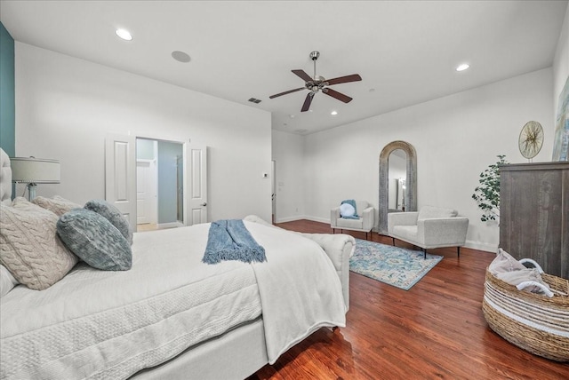709 E 1st St, Fort Worth, TX 76102 - bedroom featuring wood finished floors, recessed lighting, arched walkways, baseboards, and a ceiling fan
