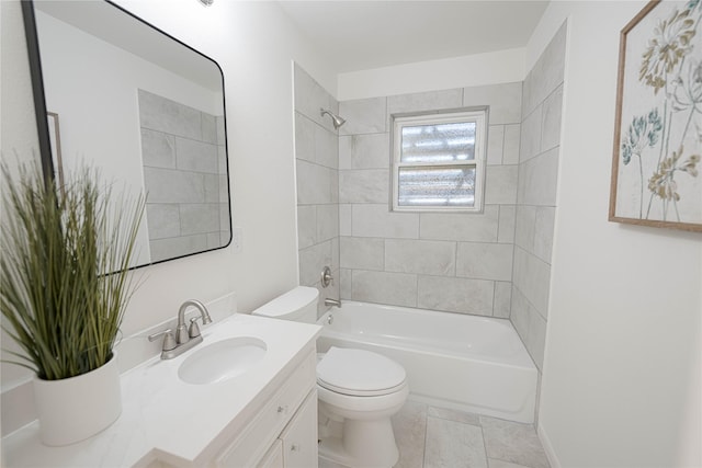 bathroom with toilet, vanity, and bathing tub / shower combination