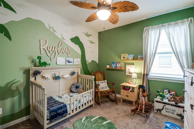 bedroom featuring ceiling fan, carpet, and baseboards