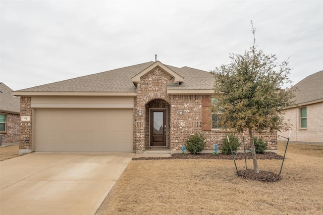 ranch-style house with an attached garage, brick siding, concrete driveway, roof with shingles, and a front lawn