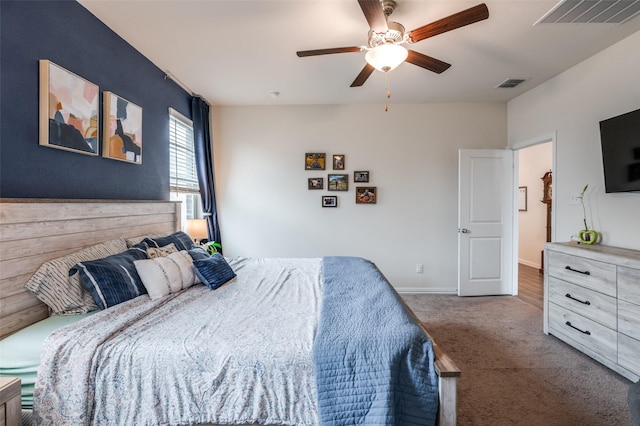 carpeted bedroom with ceiling fan, visible vents, and baseboards