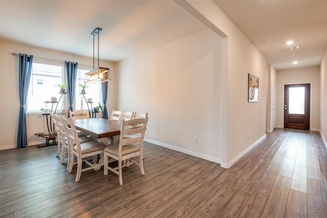 dining space featuring recessed lighting, visible vents, baseboards, and wood finished floors