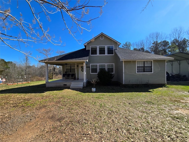 view of front of property featuring covered porch and a front yard