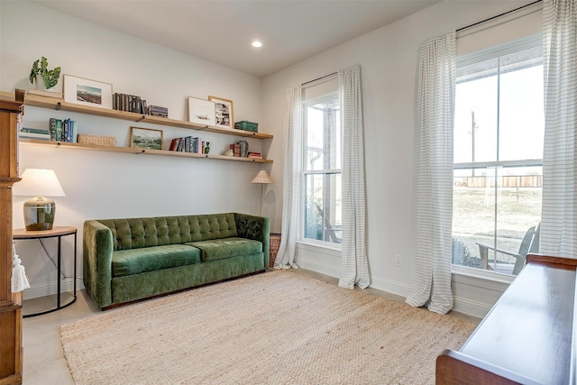 sitting room with baseboards and recessed lighting